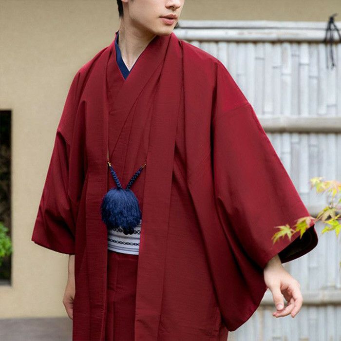 赤い紬のアンサンブル一式 包み込ん